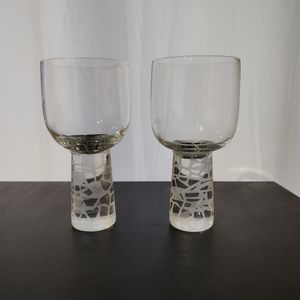 2 unbranded crystal contemporary wine goblets with a thick decorative stem